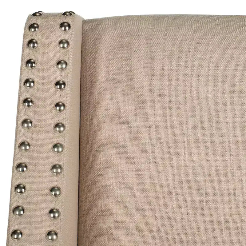 Sgabello da bancone rivestito in lino con borchie e poggiapiedi, Beige